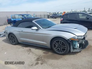 2020 Ford Mustang EcoBoost z VIN 1FATP8UH6L5131602, wystawiony jako IAAI lot #42228919 z przebiegiem 82 807 mil mil oraz . Historia ofert i sprzedaży dostępna na DreamBid. Obrazek 14.