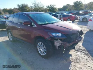 2010 Mazda CX-7 SV with VIN JM3ER2W56A0306252, listed as a IAAI auction lot 41327009 with 148,544 mi miles. Bid and sale history available at carsss.com. Image 1.