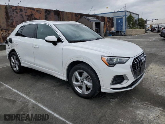 2021 Audi Q3 Premium with VIN WA1AUCF39M1061658, listed as a Copart auction lot 50717875 with 87,363 mi miles and Salvage title. Bid and sale history available at DreamBid. Image 4.