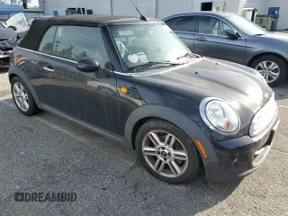 2012 MINI Convertible with VIN WMWZN3C59CT135270, listed as a Copart auction lot 48468785 with 81,726 mi miles and Clean Title. Bid and sale history available at DreamBid. Image 4.