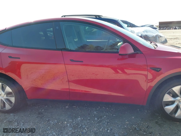 2023 Tesla Model Y Long Range with VIN 7SAYGDEE6PA040783, listed as a IAAI auction lot 41878236 with 32,436 mi miles. Bid and sale history available at carsss.com. Image 14.