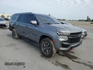 2021 Chevrolet Suburban Z71 с VIN 1GNSKDKD9MR385447, выставлен на аукционе Copart как лот 55764935 с пробегом 74 241 миль миль и Списание • Salvage title. История ставок и продаж доступна на DreamBid. Изображение 4.