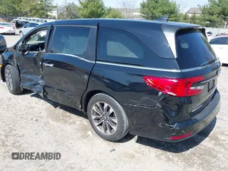 2022 Honda Odyssey EX-L with VIN 5FNRL6H72NB002554, listed as a IAAI auction lot 41932297 with 23,533 mi miles and . Bid and sale history available at DreamBid. Image 3.