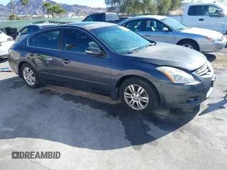 2012 Nissan Altima S z VIN 1N4AL2AP0CN469959, wystawiony jako IAAI lot #41930419 z przebiegiem 150 641 mil mil oraz . Historia ofert i sprzedaży dostępna na DreamBid. Obrazek 1.