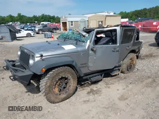 2017 Jeep Wrangler Unlimited Sport with VIN 1C4HJWDG6HL592265, listed as a IAAI auction lot 42335663 with 89,314 mi miles and . Bid and sale history available at DreamBid. Image 16.