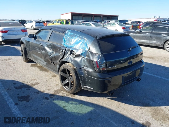 2005 Dodge Magnum RT with VIN 2D4GV58215H587205, listed as a IAAI auction lot 41371767 with 115,534 mi miles and . Bid and sale history available at carsss.com. Image 3.