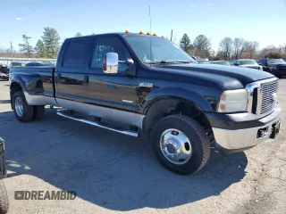 2006 Ford F-350 XL with VIN 1FTWW33P96EB51529, listed as a Copart auction lot 46811995 with 142,185 mi miles and Salvage title. Bid and sale history available at DreamBid. Image 4.