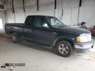 1999 Ford F-150 with VIN 1FTZX1723XNA24144, listed as a Copart auction lot 58071155 with 320,829 mi miles and Salvage title. Bid and sale history available at DreamBid. Image 4.