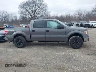 2014 Ford F-150 XL with VIN 1FTFW1EF7EFA31990, listed as a IAAI auction lot 41954531 with 158,521 mi miles. Bid and sale history available at carsss.com. Image 13.