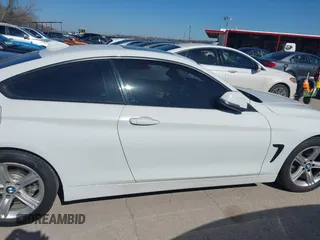 2014 BMW 4 Series 428i xDrive with VIN WBA3N9C58EF721369, listed as a IAAI auction lot 41768891 with 181,068 mi miles and . Bid and sale history available at DreamBid. Image 13.