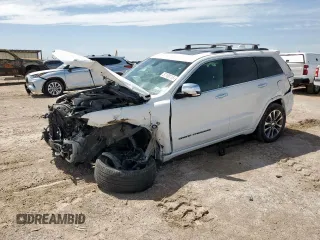 2017 Jeep Grand Cherokee Overland z VIN 1C4RJFCG1HC655066, wystawiony jako Copart lot #57109715 z przebiegiem 123 202 mil mil oraz Szkody całkowita. Historia ofert i sprzedaży dostępna na DreamBid. Obrazek 1.