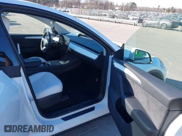 2023 Tesla Model Y Long Range with VIN 7SAYGDEE5PA094253, listed as a IAAI auction lot 41701966 with 29,458 mi miles and . Bid and sale history available at DreamBid. Image 5.