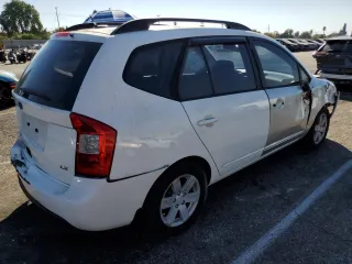 2009 Kia Rondo LX with VIN KNAFG529X97273401, listed as a Copart auction lot 75829094 with 171,062 mi miles and Salvage Title. Bid and sale history available at carsss.com. Image 3.