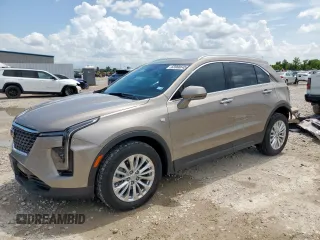2024 Cadillac XT4 FWD Luxury with VIN 1GYAZAR49RF180587, listed as a Copart auction lot 63968645 with 5,607 mi miles and Salvage title. Bid and sale history available at DreamBid. Image 1.