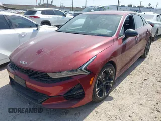 2022 Kia K5 GT-Line z VIN 5XXG64J25NG140300, wystawiony jako IAAI lot #41935077 z przebiegiem 51 279 mil mil oraz . Historia ofert i sprzedaży dostępna na DreamBid. Obrazek 2.