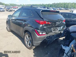 2023 Hyundai Kona SEL with VIN KM8K62ABXPU040491, listed as a IAAI auction lot 42166633 with 34,771 mi miles and . Bid and sale history available at DreamBid. Image 3.