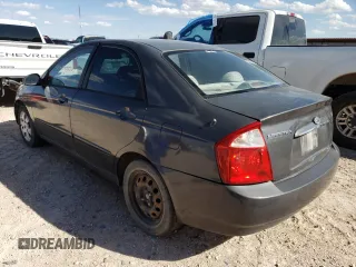 2004 Kia Spectra LX z VIN KNAFE122145052033, wystawiony jako Copart lot #47457493 z przebiegiem 148 663 mil mil oraz Czysty tytuł • Clean title. Historia ofert i sprzedaży dostępna na DreamBid. Obrazek 3.