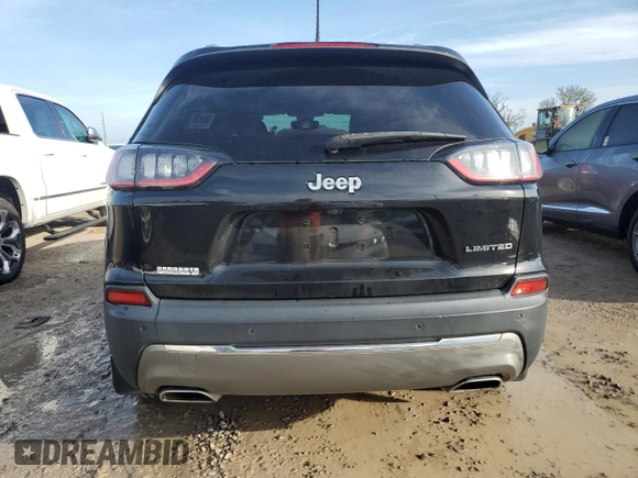 2019 Jeep Cherokee Limited with VIN 1C4PJLDN5KD135764, listed as a Copart auction lot 73637184 with 56,718 mi miles and Salvage Title. Bid and sale history available at DreamBid. Image 6.
