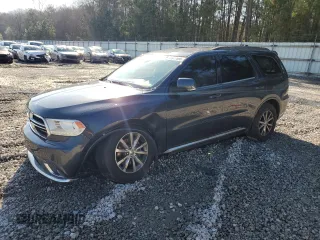 2016 Dodge Durango Limited with VIN 1C4RDJDG5GC331206, listed as a Copart auction lot 48977595 with 209,088 mi miles and Salvage Title. Bid and sale history available at DreamBid. Image 1.