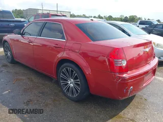 2010 Chrysler 300 with VIN 2C3CA2CV3AH279913, listed as a IAAI auction lot 40731536 with 143,969 mi miles. Bid and sale history available at carsss.com. Image 3.