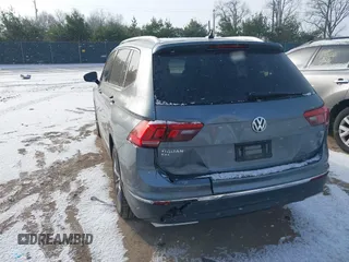 2018 Volkswagen Tiguan SEL Premium with VIN 3VV5B7AX9JM103745, listed as a IAAI auction lot 40993940 with 67,398 mi miles and . Bid and sale history available at DreamBid. Image 3.