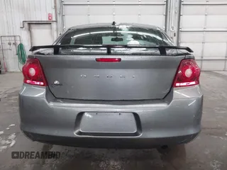 2013 Dodge Avenger SE with VIN 1C3CDZAB1DN581303, listed as a IAAI auction lot 41942469 with 123,330 mi miles. Bid and sale history available at carsss.com. Image 17.