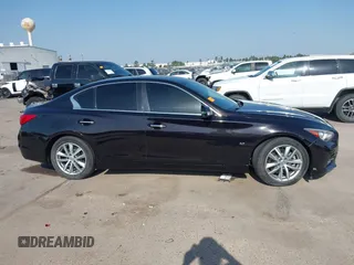 2015 Infiniti Q50 Premium with VIN JN1BV7AP1FM342558, listed as a IAAI auction lot 41975803 with 140,603 mi miles. Bid and sale history available at carsss.com. Image 13.