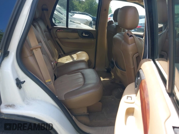 2003 GMC Envoy SLT with VIN 1GKDS13S632266506, listed as a IAAI auction lot 42149049 with 259,884 mi miles and . Bid and sale history available at DreamBid. Image 8.