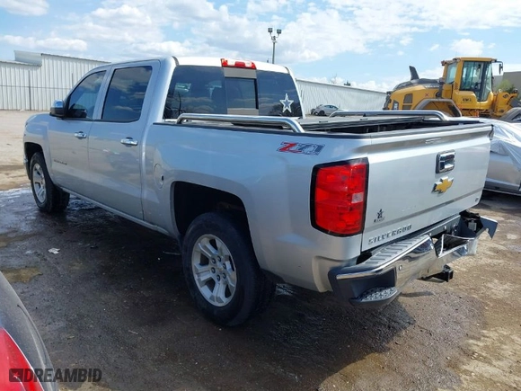 2014 Chevrolet Silverado 1500 LT with VIN 3GCUKREC3EG101975, listed as a IAAI auction lot 41868152 with 221,738 mi miles. Bid and sale history available at carsss.com. Image 3.