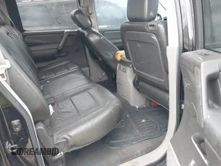 2004 Nissan Titan LE with VIN 1N6AA07A24N512509, listed as a IAAI auction lot 41075523 with 270,302 mi miles and . Bid and sale history available at DreamBid. Image 8.