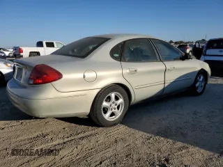2003 Ford Taurus SE Standard with VIN 1FAFP53U13G188188, listed as a Copart auction lot 73574624 with 95,017 mi miles and Salvage Title. Bid and sale history available at DreamBid. Image 3.