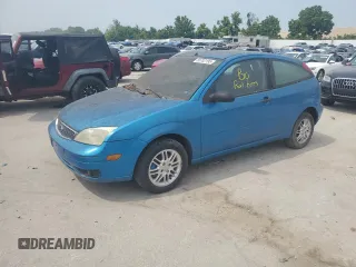 2007 Ford Focus S z VIN 1FAFP31N77W138844, wystawiony jako Copart lot #60702195 z przebiegiem Nie podano mil oraz Czysty tytuł • Clean title. Historia ofert i sprzedaży dostępna na DreamBid. Obrazek 1.