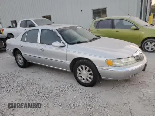 2002 Lincoln Continental with VIN 1LNHM97VX2Y672516, listed as a Copart auction lot 75595354 with 154,361 mi miles and Salvage Title. Bid and sale history available at carsss.com. Image 4.