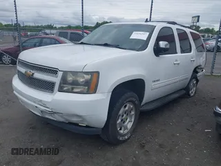 2011 Chevrolet Tahoe LT with VIN 1GNSCBE01BR146546, listed as a IAAI auction lot 39196597 with 206,906 mi miles and . Bid and sale history available at DreamBid. Image 2.