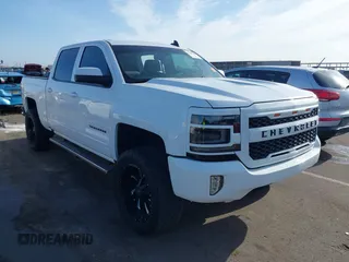 2016 Chevrolet Silverado 1500 LT with VIN 3GCPCREC1GG323802, listed as a IAAI auction lot 42008208 with 85,609 mi miles and . Bid and sale history available at DreamBid. Image 1.