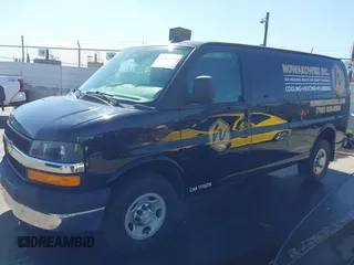 2016 Chevrolet Express Cargo Van with VIN 1GCWGAFF0G1154459, listed as a IAAI auction lot 41647930 with 100,142 mi miles. Bid and sale history available at carsss.com. Image 2.
