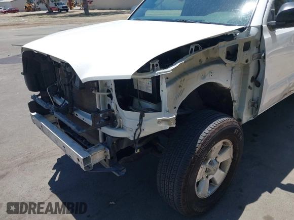 2016 Toyota Tacoma SR with VIN 5TFRX5GN0GX068205, listed as a IAAI auction lot 42685064 with 121,567 mi miles and . Bid and sale history available at DreamBid. Image 6.