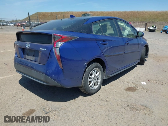 2017 Toyota Prius Two with VIN JTDKBRFUXH3044163, listed as a IAAI auction lot 42196278 with 117,610 mi miles and . Bid and sale history available at DreamBid. Image 4.