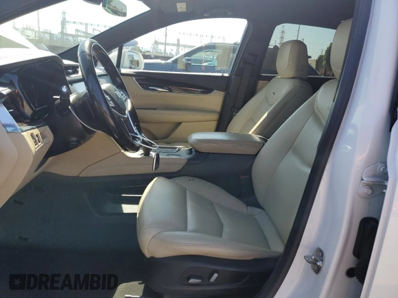 2019 Cadillac XT5 FWD with VIN 1GYKNARS1KZ121732, listed as a Copart auction lot 54882885 with 72,142 mi miles and Salvage title. Bid and sale history available at DreamBid. Image 7.