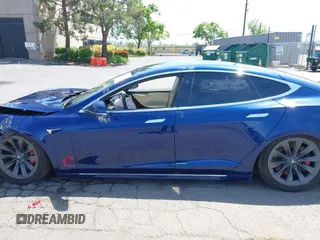 2017 Tesla Model S 100D with VIN 5YJSA1E44HF220391, listed as a IAAI auction lot 37381201 with Not Provided miles and . Bid and sale history available at DreamBid. Image 14.