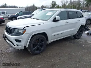 2015 Jeep Grand Cherokee Altitude with VIN 1C4RJFAG4FC942885, listed as a IAAI auction lot 41952356 with 233,276 mi miles. Bid and sale history available at carsss.com. Image 2.