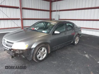 2012 Dodge Avenger SXT z VIN 1C3CDZCBXCN163432, wystawiony jako IAAI lot #39332608 z przebiegiem 169 102 mil mil oraz . Historia ofert i sprzedaży dostępna na DreamBid. Obrazek 2.