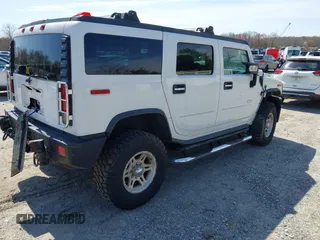 2006 Hummer H2 with VIN 5GRGN23U86H104660, listed as a IAAI auction lot 41933116 with 165,734 mi miles. Bid and sale history available at carsss.com. Image 4.