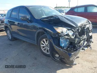 2016 Mazda CX-5 Touring with VIN JM3KE2CY6G0808992, listed as a IAAI auction lot 40969655 with 132,513 mi miles. Bid and sale history available at carsss.com. Image 1.