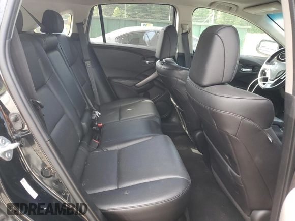 2013 Acura RDX with VIN 5J8TB4H31DL024097, listed as a Copart auction lot 57666335 with 125,038 mi miles and Salvage title. Bid and sale history available at DreamBid. Image 11.