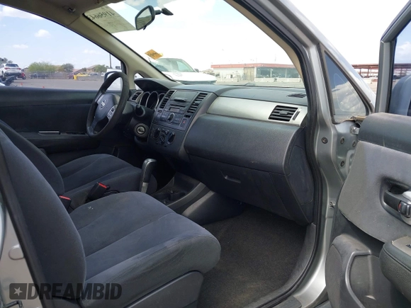 2009 Nissan Versa 1.8 S with VIN 3N1BC11E39L381507, listed as a IAAI auction lot 41956643 with 120,730 mi miles. Bid and sale history available at carsss.com. Image 5.