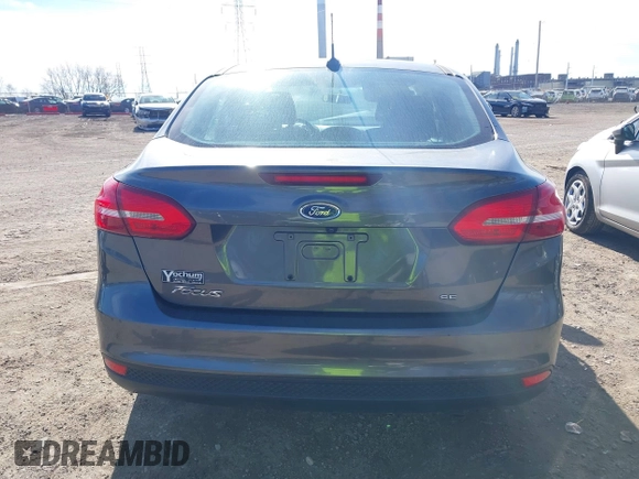 2018 Ford Focus SE z VIN 1FADP3F2XJL316101, wystawiony jako IAAI lot #40805650 z przebiegiem 53 551 mil mil oraz . Historia ofert i sprzedaży dostępna na DreamBid. Obrazek 15.