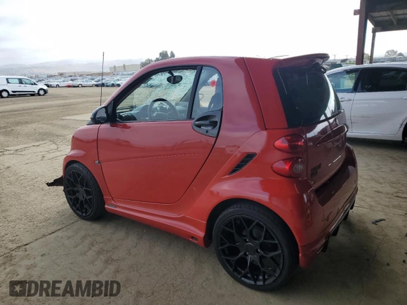 2009 Smart fortwo Pure with VIN WMEEJ31X79K249060, listed as a Copart auction lot 56927145 with Not provided miles and Salvage title. Bid and sale history available at DreamBid. Image 2.