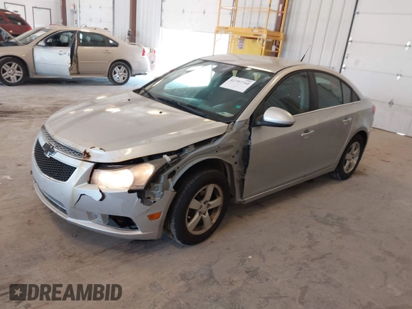 2014 Chevrolet Cruze 1LT with VIN 1G1PC5SB2E7296549, listed as a IAAI auction lot 42797744 with 137,343 mi miles and . Bid and sale history available at DreamBid. Image 2.