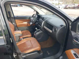 2014 Jeep Compass Limited with VIN 1C4NJDCB9ED549543, listed as a IAAI auction lot 41938699 with 195,973 mi miles. Bid and sale history available at carsss.com. Image 5.